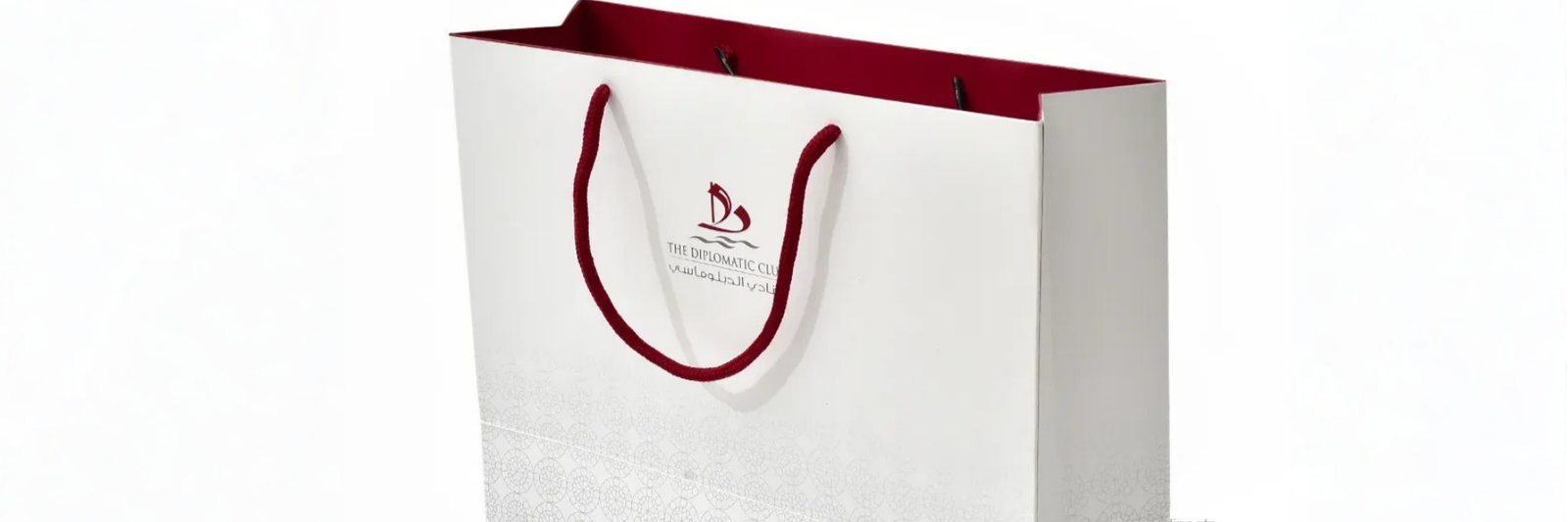 Art paper shopping bag with brand printing and ribbon handle